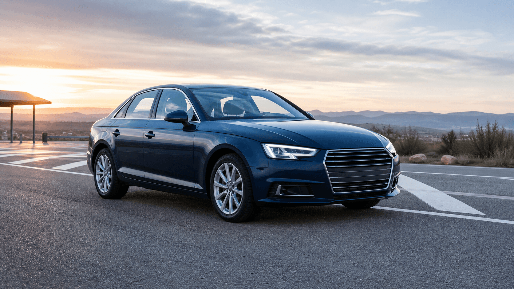 Audi A4 B9 2.0 TDI azul en una zona de carretera al amanecer